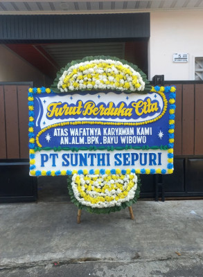 Papan Bunga Duka di Rintis