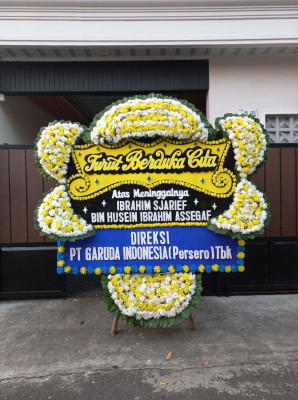 Papan Bunga Duka di Rintis