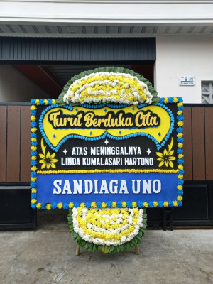 Papan Bunga Duka di Rintis