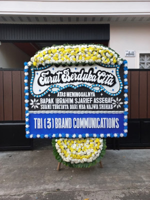Papan Bunga Duka di Rintis